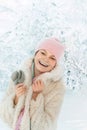 Sincere emotions. Christmas and new year. Model tender girl warm hat scarf. Winter fashion concept. Happy girl playing Royalty Free Stock Photo