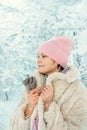 Sincere emotions. Christmas and new year. Model tender girl warm hat scarf. Winter fashion concept. Happy girl playing Royalty Free Stock Photo