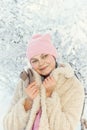 Sincere emotions. Christmas and new year. Model tender girl warm hat scarf. Winter fashion concept. Happy girl playing Royalty Free Stock Photo