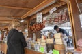 Sineu Majorca. Woman looking at a market stall that sells spanish typical products