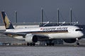 Singapore Airlines Airbus taxiing on Munich Airport, MUC snow Royalty Free Stock Photo