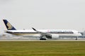 Singapore Airlines plane doing taxi on runway Royalty Free Stock Photo