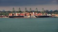 Container ship Yang Ming at anchor in the Singapore cargo port