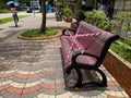 COVID-19. Social safe distancing rules in public spaces during coronavirus outbreak. Public seats park benches are sealed off with