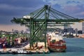 Loading cranes and containership in container port Singapore Royalty Free Stock Photo
