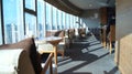 SINGAPORE - APR 2nd 2015: Lounge area of a hotel, club, company lobby. Fragment of the modern lobby with skyline view of Royalty Free Stock Photo