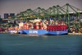 Selective shot of a COSCO SHIPPING Containership in container port Singapore Royalty Free Stock Photo