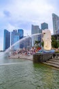 SINGAPORE-APRIL 10, 2016: The Merlion fountain in Singapore. Merlion is a imaginary creature with the head of a lion,seen as a Royalty Free Stock Photo