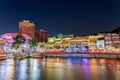 Singapore, Singapore - Aug 1, 2019 : Colorful light building at night historical riverside quay in Clarke Quay, located within the Royalty Free Stock Photo