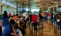 Singapore Aug2020 Social distancing ambassadors, people wearing protective face masks at Changi Airport Terminal 1 during Phase 2