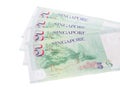 Singapore banknotes dollars 5 SGD isolated on white background Royalty Free Stock Photo