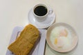 Singapore Breakfast Kaya Toast, Coffee bread and Half boiled egg Royalty Free Stock Photo