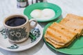 Singapore Breakfast Kaya Toast, Coffee bread and Half-boiled egg Royalty Free Stock Photo