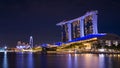 Singapore business building skyline at dawn with reflexion on waterbay in twilight time.Illuminated Marina bay sand at night Royalty Free Stock Photo