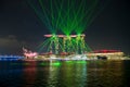 Singapore business district skyline with Laser light show at Mar