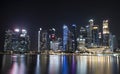 Singapore business district skyscrapers at night with reflection in water Royalty Free Stock Photo