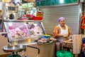 Singapore - 11 2018: Butcher at work at Tekka Indian market