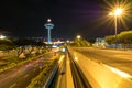 Singapore Changi Airport at night with air traffic control tower