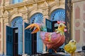 Singapore, Chicken decoration and old colonial buildings with blue windows on the street in China Town District Royalty Free Stock Photo