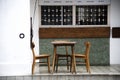 Empty tables in front of traditional shop house in Chinatown Singapore Royalty Free Stock Photo