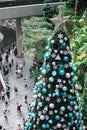 SINGAPORE - 21 DEC 2019: Tallest Christmas Tree located in Jewel Changi Airport with MRT and Tourists