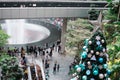 SINGAPORE - 21 DEC 2019: Tallest Christmas Tree located in Jewel Changi Airport with MRT and Tourists