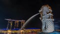 The Merlion fountain spouts water in front of the Marina Bay Sands hotel in Singapore.