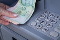 Singapore dollars withdrawn from an ATM Royalty Free Stock Photo