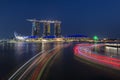 SINGAPORE, SINGAPORE - FEB 18, 2018: Marina Bay Sands and light trails from river boats, Singapore Royalty Free Stock Photo