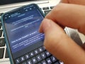 Singapore - Feb 2023: A person trying how to use ChatGPT at work