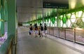 Singapore-07 FEB 2020:school uniform girl walk on the shelter bridge corridor