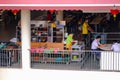 Singapore Feb2021 Tray return sorting station at Tiong Bahru hawker centre. Cleaner seen clearing used crockery trolley. People Royalty Free Stock Photo