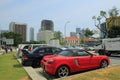 Variety of vehicles parked neatly in a corner of the city