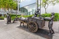 RIVER MERCHANTS, bronze sculpture by Aw Tee Hong, Singapore Royalty Free Stock Photo