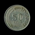 1967 Singapore Fifty Cents isolated on the black background Royalty Free Stock Photo