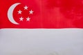 Singapore flag. Singapore Flag Day. Beautiful Flag of Singapore close up. Selebration Holiday National Day Concept.