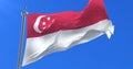 Singapore flag waving at wind in slow with blue sky, loop