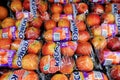 Singapore 2020 Fresh apples wrapped in plastic for sale in supermarket. Fruits and vegetables commonly packaged in plastic bags to