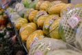 Singapore 2021 Fresh fruits individually wrapped in plastic and styrofoam nets for sale in supermarket. This common practice is