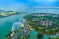 Singapore Gardens by the Bay botanical gardens aerial view and Marina Barrage dam with open sea