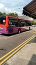 Singapore geylang road lorong early morning bus of sbs tansit sunny hot day