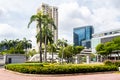 Singapore, 21/01/19. Green Parliament Place with palm trees, Elgin Bridge and city skyline in the background Royalty Free Stock Photo