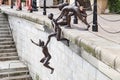 Statues of children jumping into Singapore River