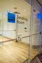 SINGAPORE, SINGAPORE - JANUARY 30, 2018: Close up of informative sign of smoking area at the interior of Changi Airport