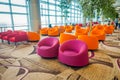 SINGAPORE, SINGAPORE - JANUARY 30, 2018: Indoor view of waiting lounge area with some colorful sofas inside of Changi