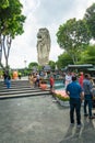 Merlion Statue on Sentosa Island and tourists in Singapore. Royalty Free Stock Photo