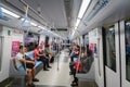 Passengers in Singapore Mass Rapid Transit MRT train. Royalty Free Stock Photo