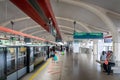 Singapore MRT train and station platform with people waiting Royalty Free Stock Photo