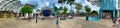 SINGAPORE - JANUARY 3, 2020: Tourists and locals enjoy Sentosa Park on a cloudy day, panoramic view