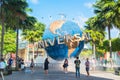 SINGAPORE - JANUARY 13 Tourists and theme park visitors taking pictures of the large rotating globe fountain in front of Universal Royalty Free Stock Photo